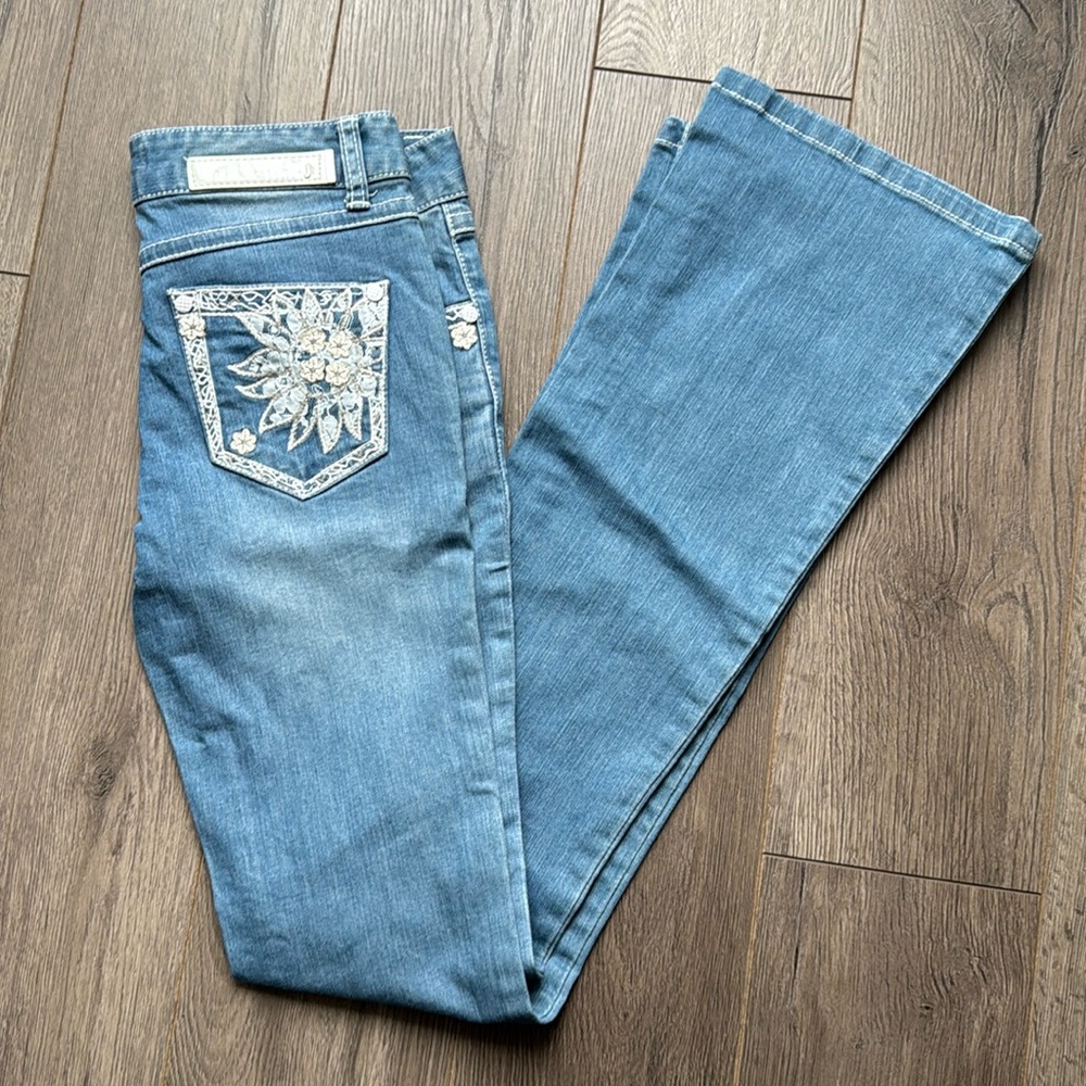 Egoist waist size 26 mid wash flares with crotchet style detailing